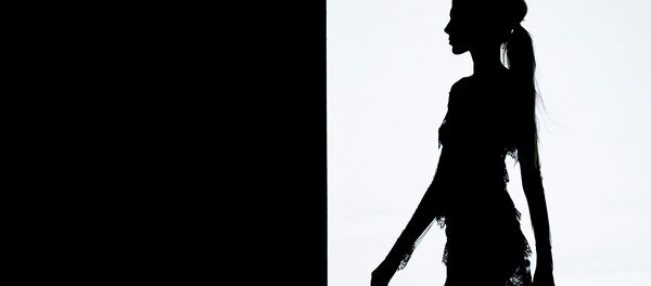 A model displays an Autumn/Winter design by Juana Martin at Madrid's Fashion Week in Madrid, Spain A model displays an Autumn/Winter design by Juana Martin at Madrid's Fashion Week in Madrid, Spain - Sputnik International