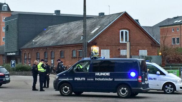 Emergency services gather outside a venue after shots were fired where an event titled Art, blasphemy and the freedom of expression was being held in Copenhagen - Sputnik International