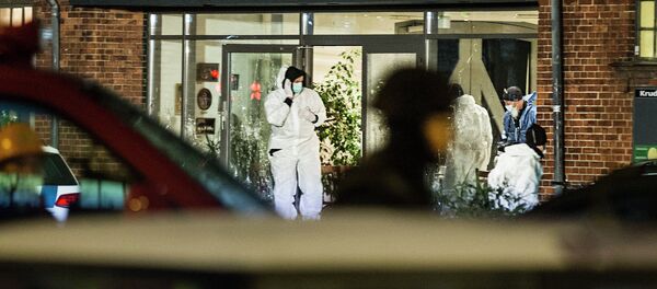 Forensic investigators are seen at the site of a shooting in Copenhagen February 14, 2015 - Sputnik International