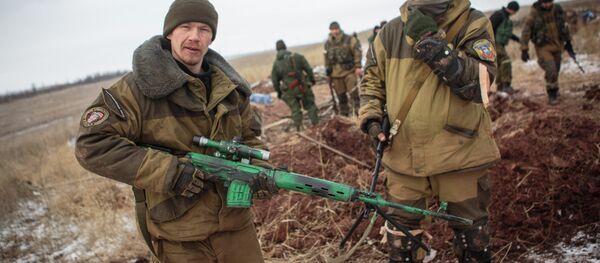 Self-defense fighters of the Donetsk People's Republic in a combat position near the village of Mala Horlivka in the Donetsk Region Self-defense fighters of the Donetsk People's Republic in a combat position near the village of Mala Horlivka in the Donetsk Region - Sputnik International