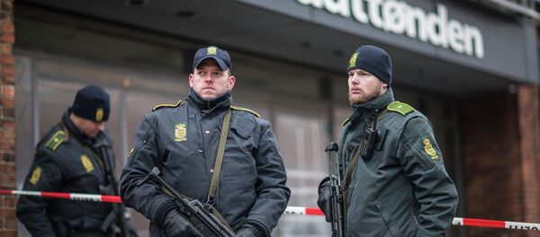 Police guard the scene of a shooting at cafe 'Krudttonden,' which was hosting a free speech event, in Oesterbro, Copenhagen, February 16, 2015 Police guard the scene of a shooting at cafe 'Krudttonden,' which was hosting a free speech event, in Oesterbro, Copenhagen, February 16, 2015 - Sputnik International