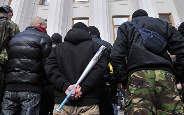 Supporters of the right wing party Pravyi Sector (Right Sector) protest in front of the Ukrainian Parliament in Kiev on March 28, 2014 - Sputnik International