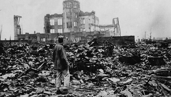 Aman looks over the expanse of ruins left the explosion of the atomic bomb on August 6, 1945 in Hiroshima, Japan - Sputnik International