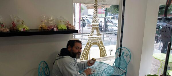 A member of the French community sits in a patisserie in Netanya, a city of 180,000 on the Mediterranean north of Tel Aviv, that has become the semi-official capital of the French community in Israel January 25, 2015 A member of the French community sits in a patisserie in Netanya, a city of 180,000 on the Mediterranean north of Tel Aviv, that has become the semi-official capital of the French community in Israel January 25, 2015 - Sputnik International