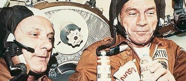 The astronauts Stafford (left) and Slayton after the successful docking manoeuver on board of the Soviet space craft Soyuz The astronauts Stafford (left) and Slayton after the successful docking manoeuver on board of the Soviet space craft Soyuz - Sputnik International