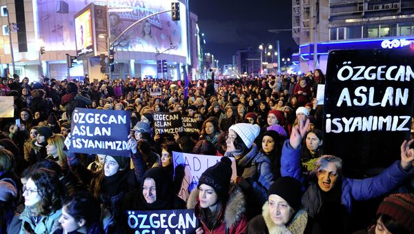Women shout slogans and hold placards reading Ozgecan Aslan is our rebellion during a demostration in Istanbul on February 14, 2015, against the murder of a young woman named Ozgecan Aslan - Sputnik International
