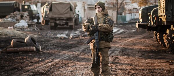 A DPR militiaman on the outskirts of Debaltsevo, Donetsk Region. A DPR militiaman on the outskirts of Debaltsevo, Donetsk Region. - Sputnik International