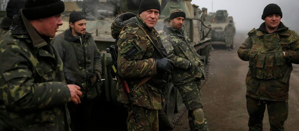 Members of the Ukrainian armed forces are seen not far from Debaltseve, eastern Ukraine February 15, 2015 Members of the Ukrainian armed forces are seen not far from Debaltseve, eastern Ukraine February 15, 2015 - Sputnik International