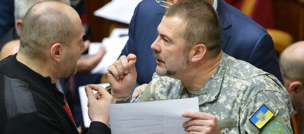 From left: Borislav Bereza, chief spokesman for the Right Sector, and Yury Bereza, commander of the Dnepr battalion, attending Ukraine's Supreme Rada (Parliament) meeting From left: Borislav Bereza, chief spokesman for the Right Sector, and Yury Bereza, commander of the Dnepr battalion, attending Ukraine's Supreme Rada (Parliament) meeting - Sputnik International