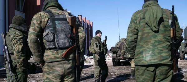 Fighters with separatist self-proclaimed Donetsk People's Republic army rest before returning to the front line from the village of Nikishine, south east of Debaltseve February 17, 2015 Fighters with separatist self-proclaimed Donetsk People's Republic army rest before returning to the front line from the village of Nikishine, south east of Debaltseve February 17, 2015 - Sputnik International