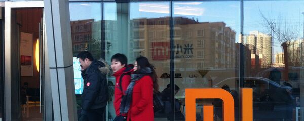 Xiaomi's 186.5 percent year-on-year growth has taken everyone by surprise. Above: Xiaomi logo sign. Xiaomi's 186.5 percent year-on-year growth has taken everyone by surprise. Above: Xiaomi logo sign. - Sputnik International