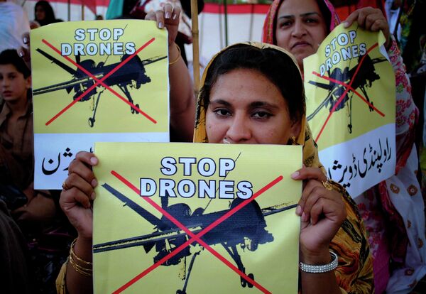 Pakistani women rally against the US drone strikes in tribal areas. - Sputnik International
