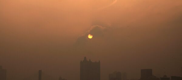This picture taken on January 29, 2013 shows a general view of buildings in the heavy smog in Jilin, northeast China's Jilin province This picture taken on January 29, 2013 shows a general view of buildings in the heavy smog in Jilin, northeast China's Jilin province - Sputnik International