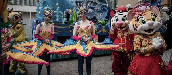 Performers gather during preparations for Chinese lunar new year celebrations in Hong Kong Performers gather during preparations for Chinese lunar new year celebrations in Hong Kong - Sputnik International