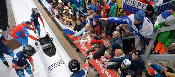 Nikita Zakharov, Maxim Mokrousov, Kirill Antyukh and Vasily Kondratenko (Russia) at the finish of a heat during the four man bob event at the Bobsleigh World Cup 8 in Sochi Nikita Zakharov, Maxim Mokrousov, Kirill Antyukh and Vasily Kondratenko (Russia) at the finish of a heat during the four man bob event at the Bobsleigh World Cup 8 in Sochi - Sputnik International