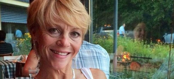 Christina Bond, 55, was repositioning her handgun inside her brassiere, looking down, when she fired a round in her eye. - Sputnik International