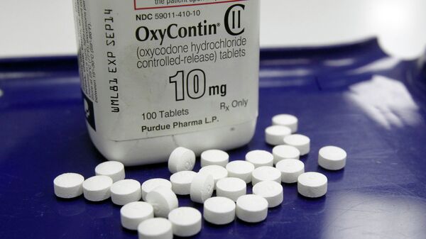 OxyContin pills are arranged for a photo at a pharmacy in Montpelier, Vt. - Sputnik International