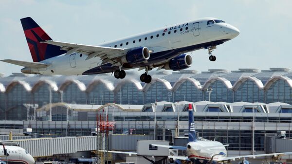 A Delta Air Lines jet takes off from Ronald Reagan Washington National Airport in Arlington, Virginia. - Sputnik International