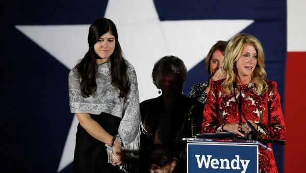 Texas Democratic gubernatorial candidate Wendy Davis becomes emotional as she speaks about supporters she met on the campaign trail while making her concession speech at her election watch party - Sputnik International