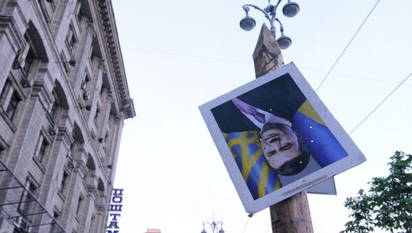 Portrait of ousted Ukrainian President Viktor Yanukovych on Independence Square in Kiev - Sputnik International