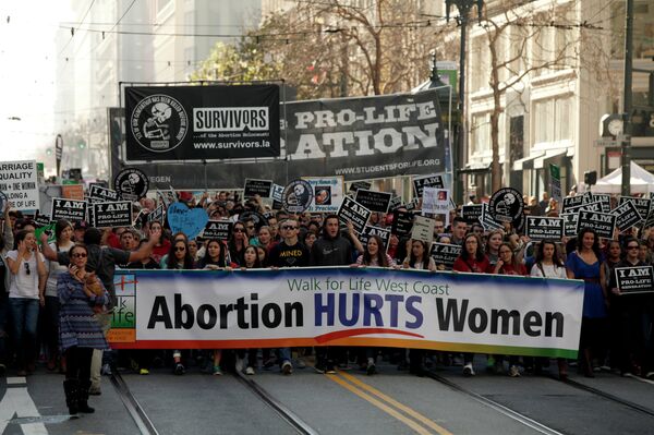 Thousands march down Market Street in San Franciscao during the Walk for Life rally and march last month. Thousands march down Market Street in San Franciscao during the Walk for Life rally and march last month. - Sputnik International