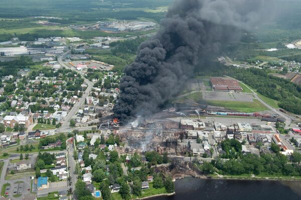 A large swath of Lac Megantic was destroyed after a train carrying crude oil derailed, sparking several explosions and forcing the evacuation of up to 1,000 people. A large swath of Lac Megantic was destroyed after a train carrying crude oil derailed, sparking several explosions and forcing the evacuation of up to 1,000 people. - Sputnik International