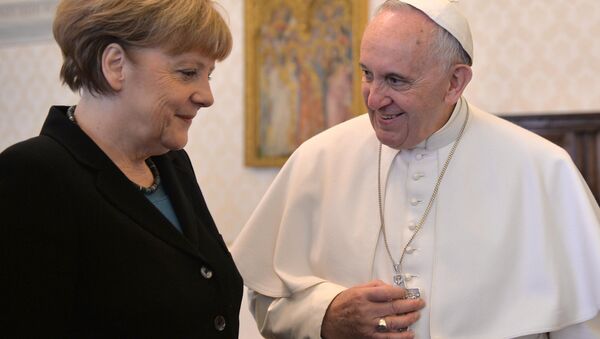Pope Francis welcomes Angela Merkel, Chancellor of Germany, during a private audience in the pontiff's library, in the Vatican City - Sputnik International
