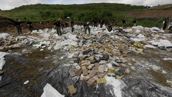 Ecuador authorities seized about a ton of cocaine en route to Galapagos Islands. The country has become a transit territory for drug trafficking because of its location between Colombia and Peru, two major cocaine-producing countries. - Sputnik International