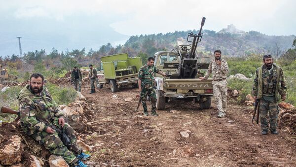 Syrian soldiers on a mountain not far from the militants' positions near Kessab - Sputnik International