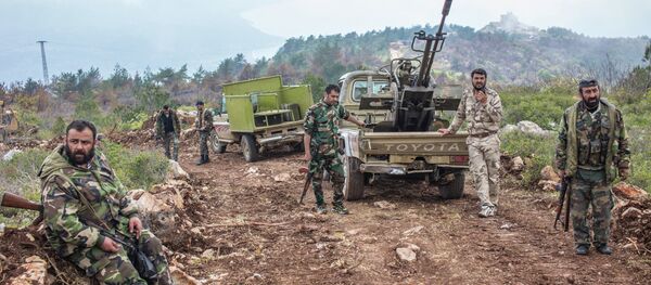 Syrian soldiers on a mountain not far from the militants' positions near Kessab Syrian soldiers on a mountain not far from the militants' positions near Kessab - Sputnik International