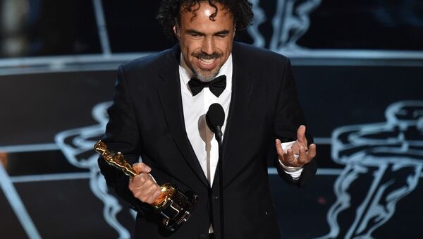 Alejandro G. Inarritu accepts the award for best director for Birdman or (The Unexpected Virtue of Ignorance) at the Oscars on Sunday, Feb. 22, 2015, at the Dolby Theatre in Los Angeles - Sputnik International