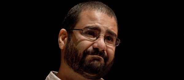 Egypt’s most prominent activist Alaa Abdel-Fattah takes a moment as he speaks about his late father Ahmed Seif, one of Egypt’s most respected human rights lawyers - Sputnik International