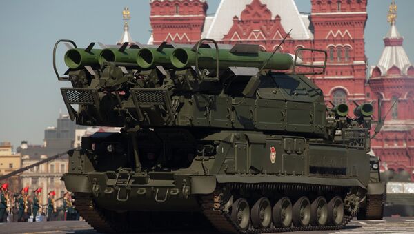 Russian Buk air defense missile systems make their way through Red Square during a rehearsal for the Victory Day military parade in Moscow - Sputnik International