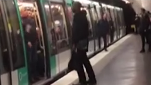 One former cop and acting director of a human rights group admitted his involvement in a racist incident on the Paris Metro last week. - Sputnik International