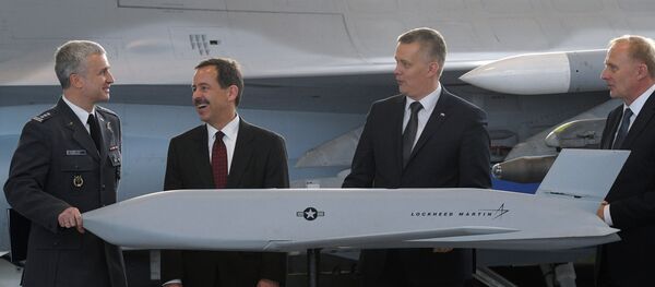 Polish and US officials with a model of the JASSM air-to-surface missile system, purchased by Poland in December, 2014. Polish and US officials with a model of the JASSM air-to-surface missile system, purchased by Poland in December, 2014. - Sputnik International