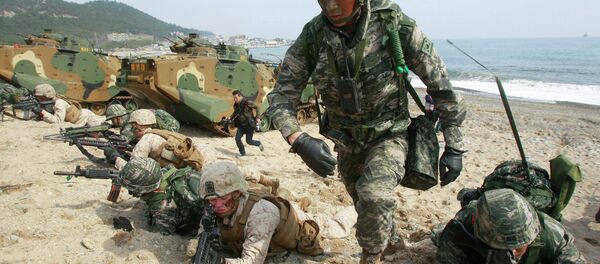South Korean and U.S. Marines participate in the U.S.-South Korea joint landing exercises called Ssangyong, part of the Foal Eagle military exercises, in Pohang, South Korea, Monday, March 31, 2014 South Korean and U.S. Marines participate in the U.S.-South Korea joint landing exercises called Ssangyong, part of the Foal Eagle military exercises, in Pohang, South Korea, Monday, March 31, 2014 - Sputnik International