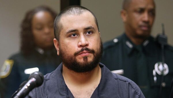 George Zimmerman, acquitted in the high-profile killing of unarmed black teenager Trayvon Martin, listens in court, in Sanford, Fla., during his hearing on charges including aggravated assault stemming from a fight with his girlfriend. - Sputnik International