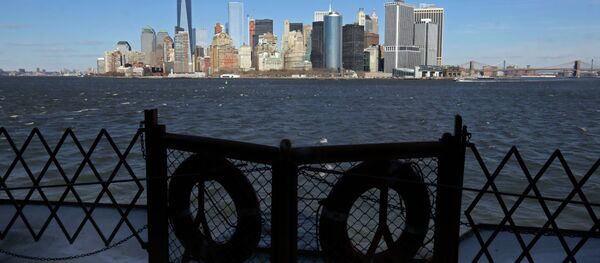Lower Manhattan appears behind a pair life preservers on a Staten Island Ferry in New York Harbor. - Sputnik International