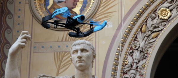 The new Bebop Parrot drone flies front of a Rome marble statue August en Triomphateur during a presentation to the press in Paris, France, Friday, Nov. 7, 2014 The new Bebop Parrot drone flies front of a Rome marble statue August en Triomphateur during a presentation to the press in Paris, France, Friday, Nov. 7, 2014 - Sputnik International