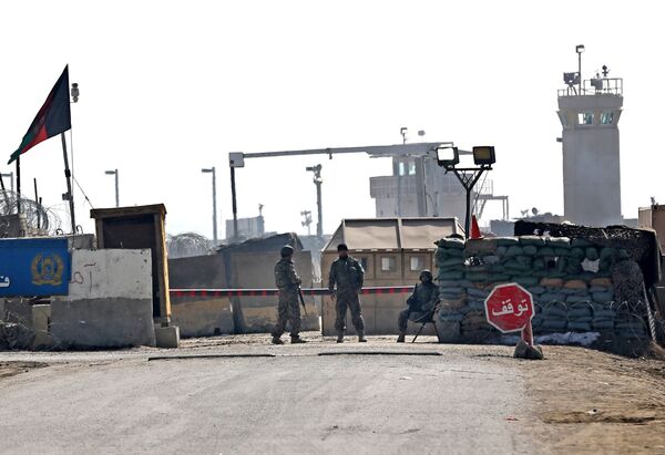 Afghan National Army (ANA) soldiers stand guard at the main gate of the Parwan Detention Facility Center on the outskirts of Bagram, some 50 kilometers (30 miles) north of Kabul, Afghanistan Afghan National Army (ANA) soldiers stand guard at the main gate of the Parwan Detention Facility Center on the outskirts of Bagram, some 50 kilometers (30 miles) north of Kabul, Afghanistan - Sputnik International