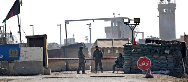 Afghan National Army (ANA) soldiers stand guard at the main gate of the Parwan Detention Facility Center on the outskirts of Bagram, some 50 kilometers (30 miles) north of Kabul, Afghanistan - Sputnik International