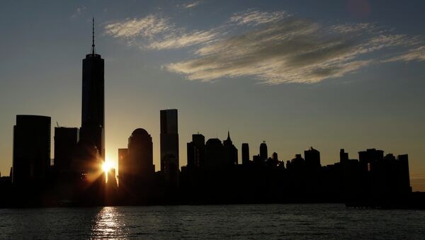 The sun rises next to One World Trade Center - Sputnik International