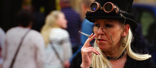Woman smoking in the street of Lincoln, UK Woman smoking in the street of Lincoln, UK - Sputnik International