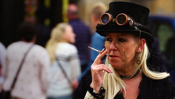 Woman smoking in the street of Lincoln, UK - Sputnik International