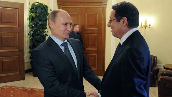 February 25, 2015. Russian President Vladimir Putin, left, and President of Cyprus Nicos Anastasiades meet in Novo-Ogaryovo - Sputnik International