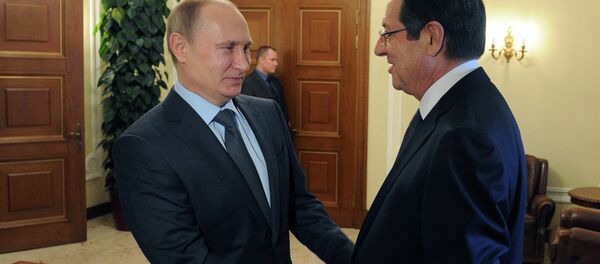 February 25, 2015. Russian President Vladimir Putin, left, and President of Cyprus Nicos Anastasiades meet in Novo-Ogaryovo February 25, 2015. Russian President Vladimir Putin, left, and President of Cyprus Nicos Anastasiades meet in Novo-Ogaryovo - Sputnik International