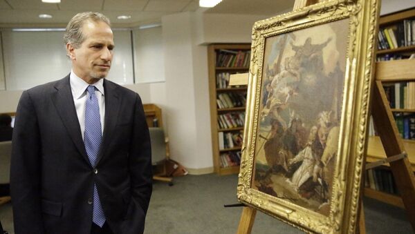 Richard Zabel, Deputy U.S. Attorney for the Southern District of New York looks at the 18th-century painting attributed to painter Giovanni Battista Tiepolo, The Holy Trinity appearing to Saint Clement, during a ceremony to return the painting and an Etruscan bronze statuette depicting the Greek hero Herakles, to the Italian government - Sputnik International