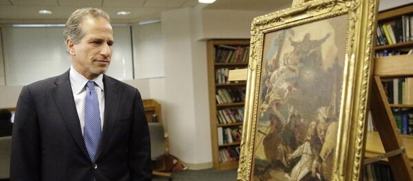 Richard Zabel, Deputy U.S. Attorney for the Southern District of New York looks at the 18th-century painting attributed to painter Giovanni Battista Tiepolo, The Holy Trinity appearing to Saint Clement, during a ceremony to return the painting and an Etruscan bronze statuette depicting the Greek hero Herakles, to the Italian government Richard Zabel, Deputy U.S. Attorney for the Southern District of New York looks at the 18th-century painting attributed to painter Giovanni Battista Tiepolo, The Holy Trinity appearing to Saint Clement, during a ceremony to return the painting and an Etruscan bronze statuette depicting the Greek hero Herakles, to the Italian government - Sputnik International