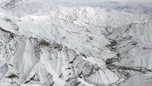An aerial view shows Salang village covered with snow after avalanches killed at least 165 people at the Salang tunnel in Parwan province. File Photo - Sputnik International