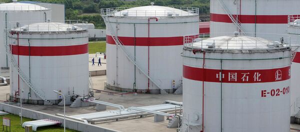 Oil tanks are seen at a Sinopec plant in Hefei Oil tanks are seen at a Sinopec plant in Hefei - Sputnik International